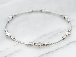 Twisting Links Diamond Bezel Bracelet