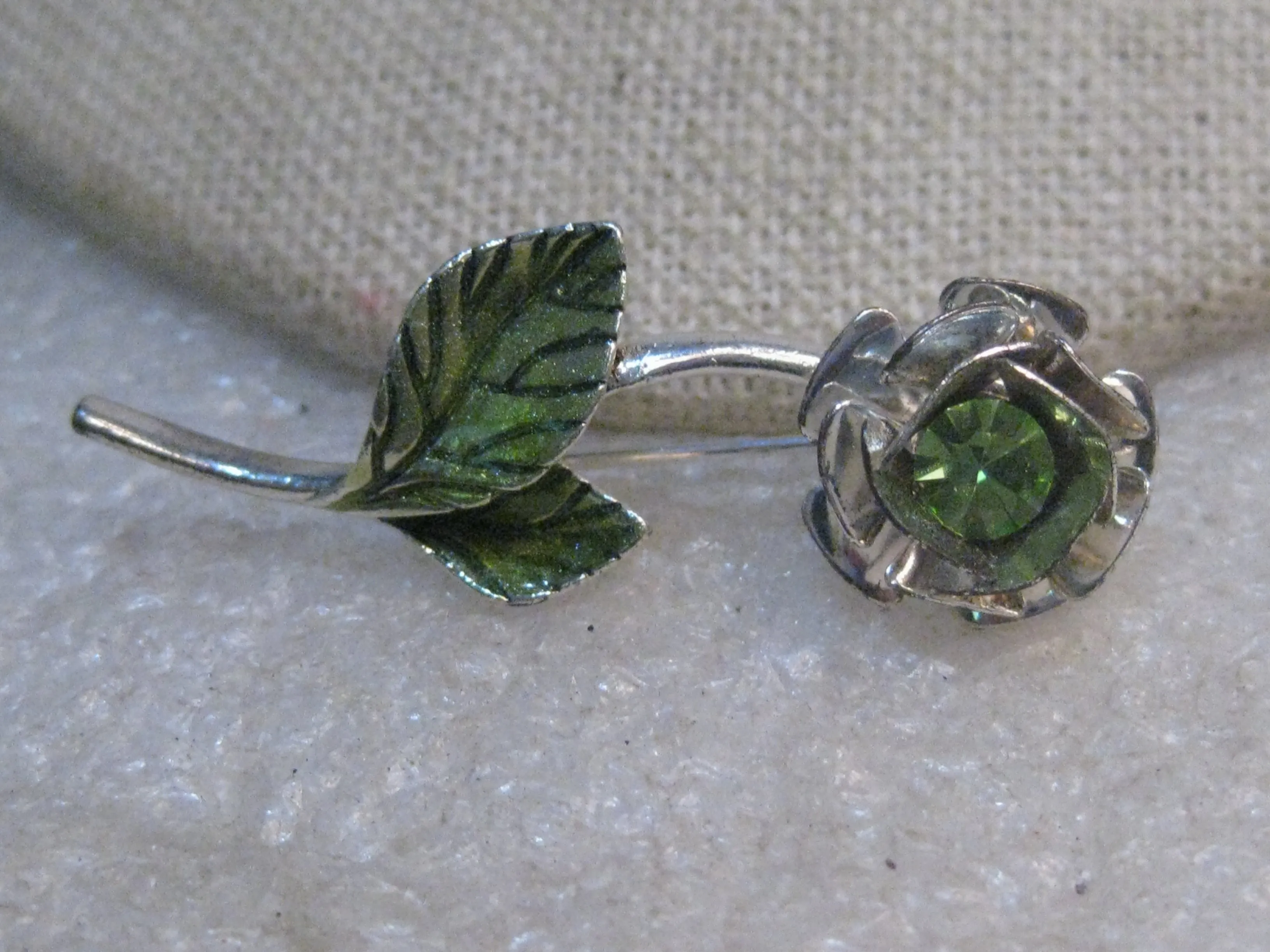 Vintage Avon Rhinestone Rose Brooch, Enameled Leaves, signed Avon SH, Silver Tone