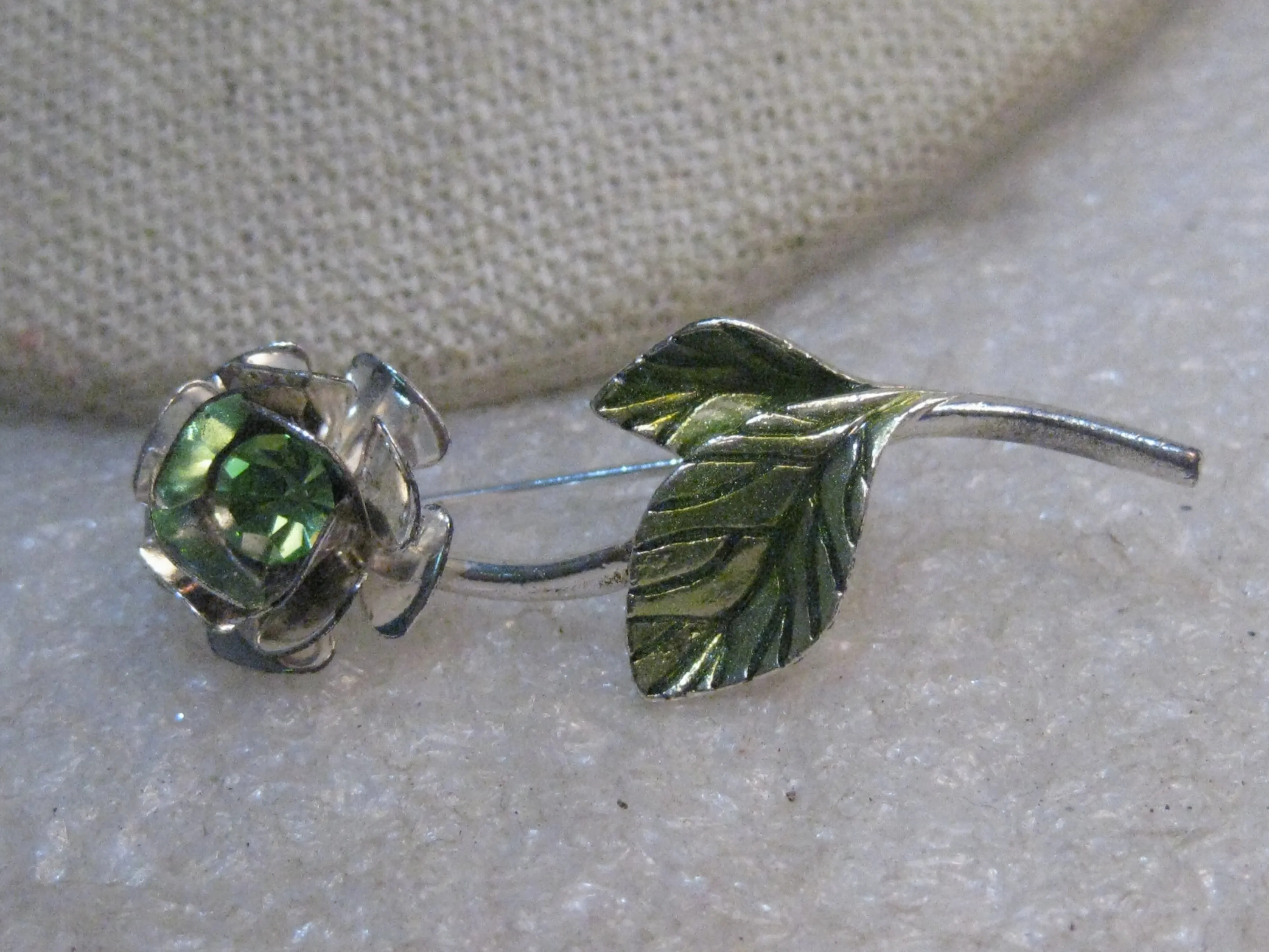 Vintage Avon Rhinestone Rose Brooch, Enameled Leaves, signed Avon SH, Silver Tone