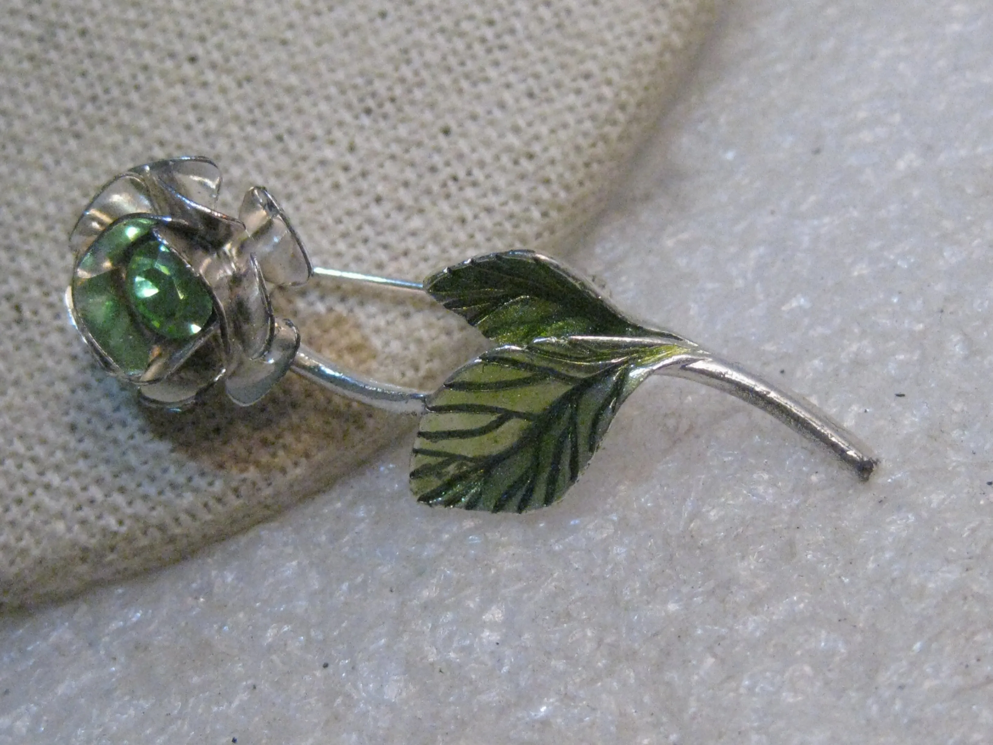 Vintage Avon Rhinestone Rose Brooch, Enameled Leaves, signed Avon SH, Silver Tone